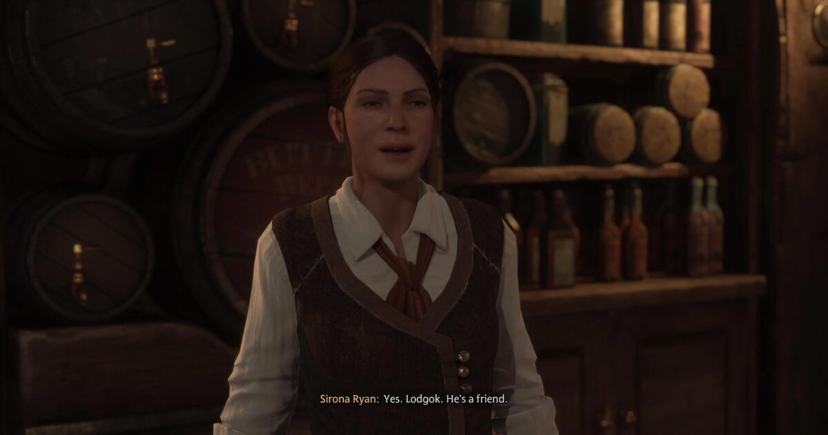 Personaggio davanti a una porta con falene nel Collectors Cave di Hogwarts Legacy