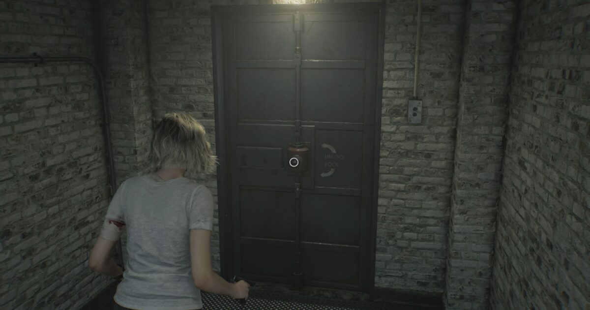Porta della Cold Storage da aprire nel Care Center con un meccanismo esagonale visibile
