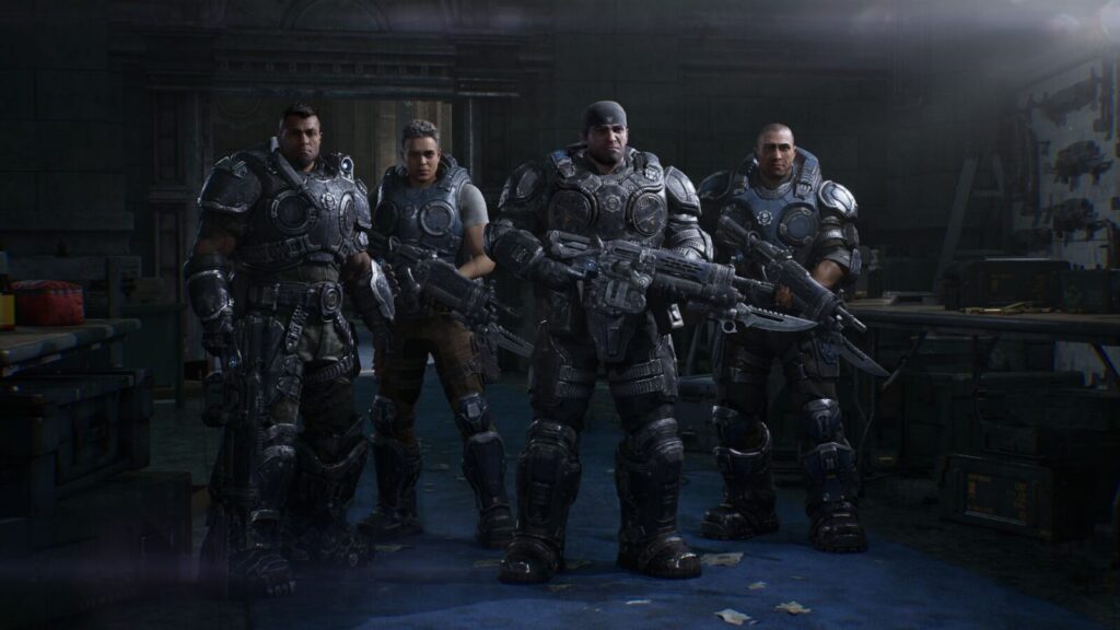 Quattro soldati della squadra Bravo armati e in armatura in Gears of War E Day
