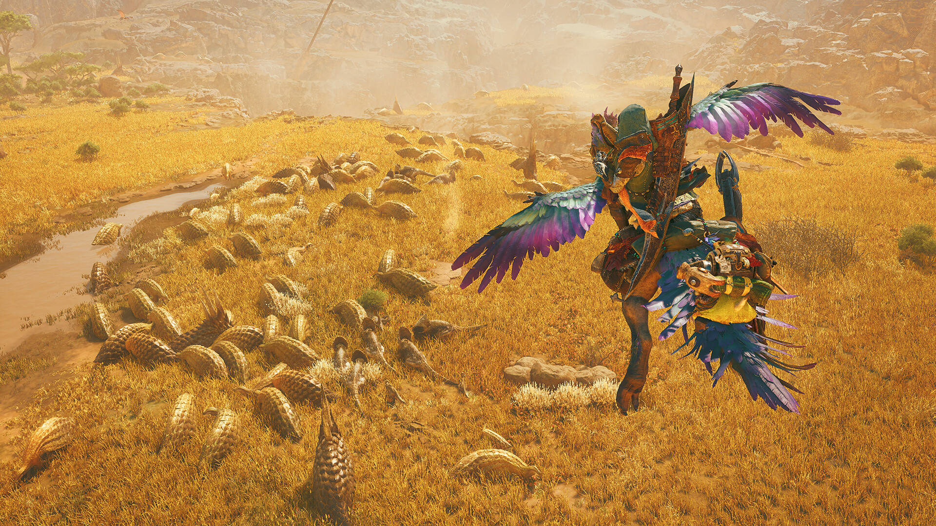 Cacciatore in sella al Seikret nella savana di Monster Hunter Wilds
